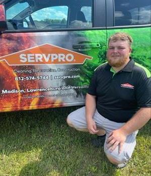 Josh pictured in front of our truck.